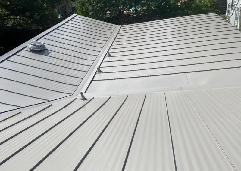 Solar attic fan installed on a metal roof for Roof Ventilation in Sharon Hill